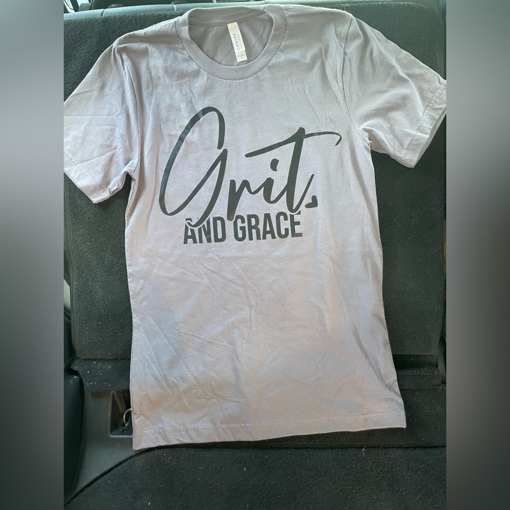 Grit and Grace. Bella canvas, and 100% cotton.